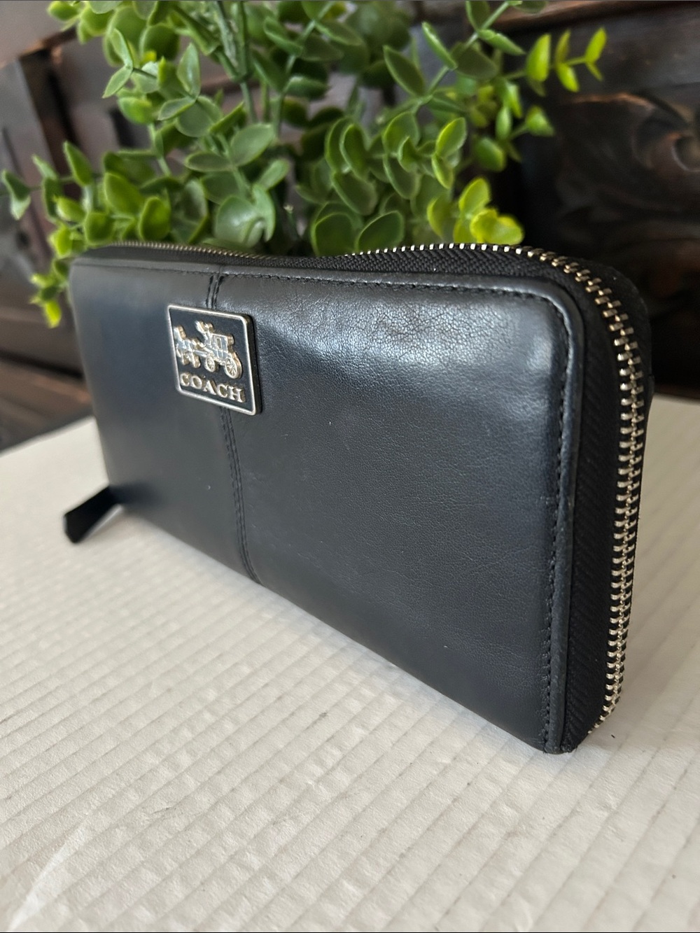 Coach Black Leather Zip Wallet with Silver Logo Plaque